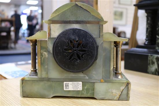 A Victorian black slate mantel clock and an onyx clock